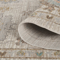 traditional beige rug closeup rolled