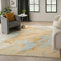 sand blue abstract rug in a living room with furniture