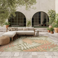 floral sage rose rug outdoors with furniture and plants