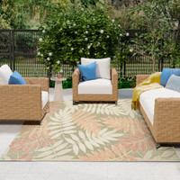 floral sage rose rug outdoors with furniture and plants