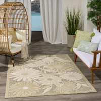 floral ivory sage rug indoors dark setting