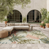 floral ivory green rug outdoors with furniture and plants