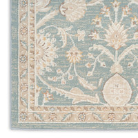 blue traditional rug closeup corner with white background