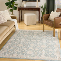 blue traditional rug living room with natural decor