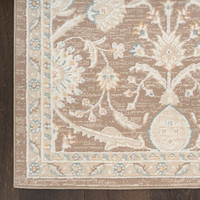 brown traditional rug closeup corner with dark wood floor