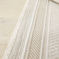 cream beige modern rug closeup edge
