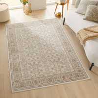 grey khaki traditional rug in a living room with white decor