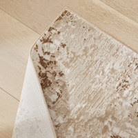 beige abstract rug closeup fold