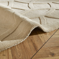 beige wool rug closeup fold