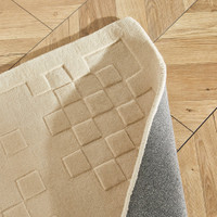 ivory wool rug closeup folded