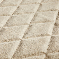 beige wool rug closeup detail