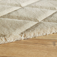 ivory wool rug closeup edge