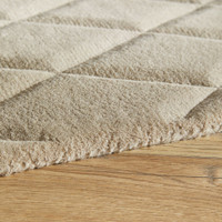 ivory wool rug closeup edge