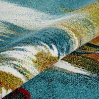 multicolour abstract rug closeup partially rolled
