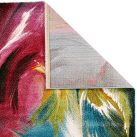 multicolour abstract rug closeup corner folded on white background