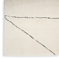 ivory black abstract linear rug closeup corner silo