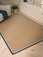 blue cream jute rug in a living room with matching decor