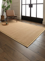 sage linen jute rug in a living room with matching decor