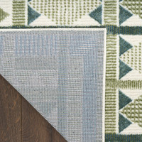 green blue geometric rug corner fold