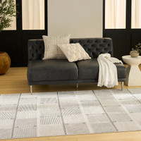 ivory grey geometric rug in a living room