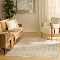ivory blue geometric rug in a living room