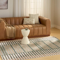 ivory multi geometric rug in a living room
