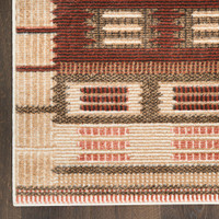 rust geometric rug closeup corner