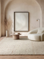 ivory wool rug in living room with matching decor
