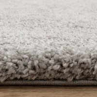 silver shaggy rug closeup pile height