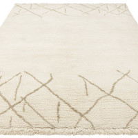 cream berber shaggy wool rug portrait angle