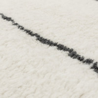 cream berber shaggy wool rug closeup detail