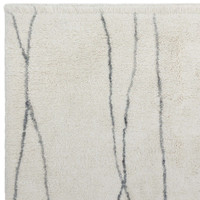 cream berber shaggy wool rug portrait corner