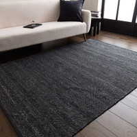 indigo plain rug in a living room with matching decor