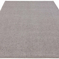 grey plain flatweave rug portrait angle