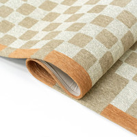 grey chess eco rug fold on white floor