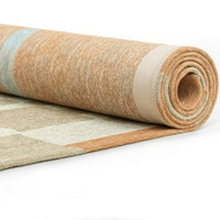grey chess eco rug rolled on white floor