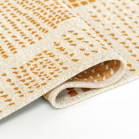 yellow abstract eco rug closeup fold on white floor