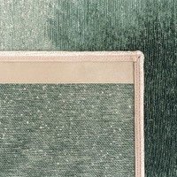 green abstract rug closeup corner fold
