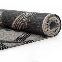 grey  rug rolled on white floor