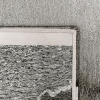 black abstract eco rug closeup corner fold