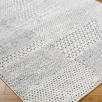 ivory scandi rug closeup corner on wood floor