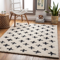 cream shaggy rug in a room with matching decor