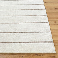 ivory scandi rug closeup corner on wood floor