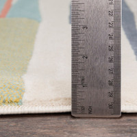 multicolour abstract rug pile height on wood floor