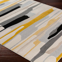 multicolour abstract rug in a room with matching decor