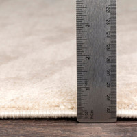 grey zebra pattern rug pile height on wood floor