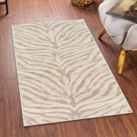 grey zebra pattern rug in a room with matching decor