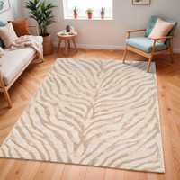 grey zebra pattern rug in a room with matching decor