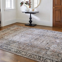 brown traditional rug in a room with matching decor