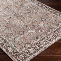 brown traditional rug closeup corner on wood floor